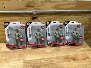 lot 105 image: DISNEY Lot of 4 Luke Skywalker Action Figures