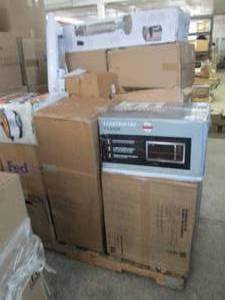 Pallet of items with issues for rep...