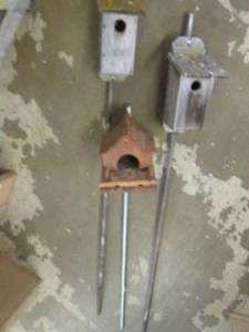 3 bird houses on metal poles ...