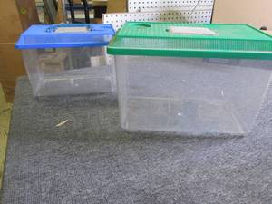 2 plastic critter pens...
