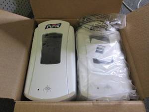 case of 4 purell dispensers ...
