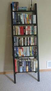 lot 17 image: Book shelf including books by John ...