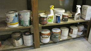 lot 45 image: Many gallons of used paint.