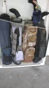 lot 112 image: Misc. golf clubs and bags...