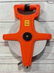 lot 49 image: New 200 Foot Tape Measure