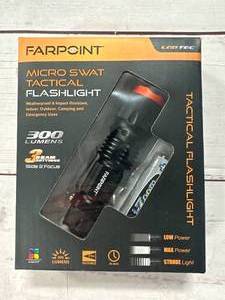 lot 79 image: New Micro Swat Tactical Flashlight