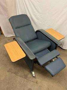 lot 9 image: MSRP $2500 High Quality Stryker Mobile&nbspFull Recline Geri Chair&nbspRecliner With Woodgrain Laminate Flip Up Tables - Great Condition