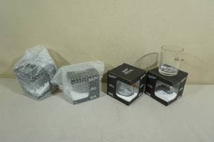 lot 45 image: Lucky Shot Rocks Glasses with Embedded Bullets