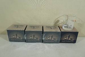 lot 46 image: Rocks Glasses with Embedded Bullets - Bad Governments Ban Guns