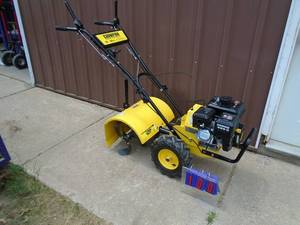 lot 100 image: Champion 212cc rear tiller. 2 speed. Used on time. 19 till path. As shown. THIS ITEM HAS A RESERVE.