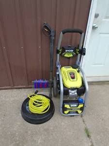 lot 104 image: Ryobi 3300 psi pressure washer with accessories. Looks lightly used. Hose & wand is not  correct as pcitured. As shown. THIS ITEM HAS A RESERVE.