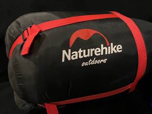 lot 38 image: Outdoor Nature Hike Sleeping Bag and Rolling Igloo Cooler