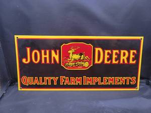 lot 726 image: John Deere Quality Farm Implements Porcelain Sign - Reproduction - 18 x 8