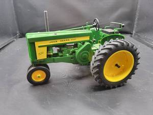 lot 731 image: John Deere 720 Diesel Plastic Tractor Model - Made by Yoders New Paris, IN - 116 Scale