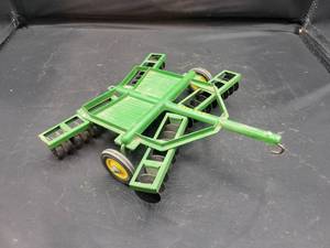 lot 748 image: ERTL John Deere Disc Diecast Model - 116 Scale