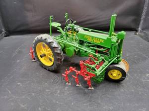 lot 761 image: ERTL Precisian Series #2 John Deere Model A Diecast Tractor Model with Cultivator - 116 Scale