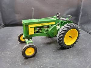 lot 793 image: John Deere 720 Diesel Plastic Tractor Model - Made by Yoders New Paris, IN - 116 Scale