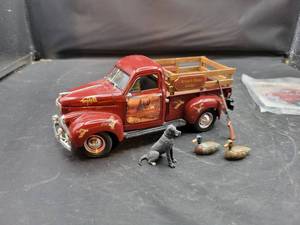 lot 836 image: Terry Redlin Diecast 1947 Studebaker Pickup - 116 Scale