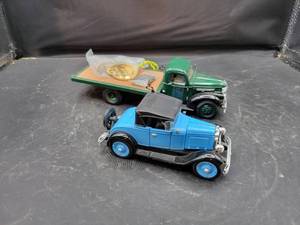 lot 838 image: 1941 Chevrolet Flatbed Truck and 1928 Chevrolet Roadster Diecast Models