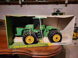 lot 780 image: ERTL John Deere 9400 4WD Diecast Tractor Model in Box - 116 Scale - Images Coming Soon