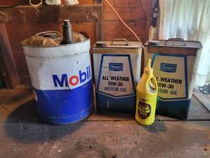 lot 241 image: Mobil Pegasus 5-Gallon Oil Can (Full), (2) Sears 2-Gallon Cans (Partials) and Pennzoil Gear Lube