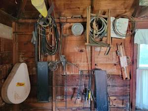 lot 247 image: Antique Seeders, Grates, Copper Tubing and More on Wall