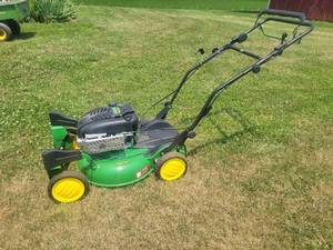 lot 10 image: John Deere Caster Action Self-Propelled Walk Behind Mower Model JS63C - Starts and Runs