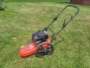 lot 11 image: DR Walk Behind Trimmer  Mower - Starts and Runs