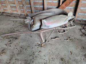 lot 492 image: Antique Steel Wheel Wheelbarrow with (5) Tubes of Sand
