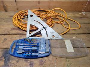 lot 396 image: Stanley 46-052 Adjustable Aluminum Square, Extension Cord and Ryobi Drill Bit Kit