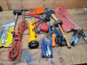 lot 397 image: Large Lot of Assorted Hand Tools - Hammers, Level, Basin Wrench, extension Cord, tape Measure and More