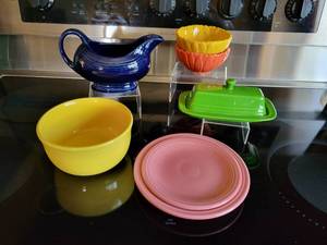 lot 134G image: Lot of Homer-Laughlin Fiestaware Sunflower Gusto Bowl, Lapis Gravy Boat, Clover Butter Dish, Pair of Rose Salad and Dessert Plates, and a Pair of DWSMWS Bowls