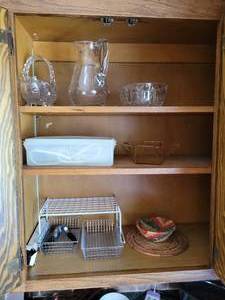 lot 139 image: Contents of Cabinet - Glass Serveware, Toastmaster Electric Knife, and More
