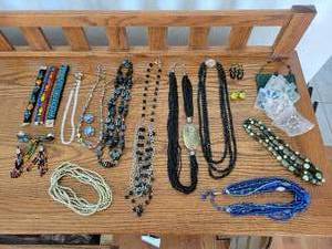 lot 146 image: Lot of Beaded Jewelry - Earrings, Bracelet, Necklaces, and Wine Charms