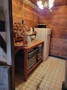 lot 461 image: Contents of Kitchenette - Vintage GE Refrigerator, Chicago Cutlery Knives, Glasses and More