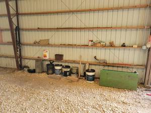 lot 487 image: Large Lot of Misc. Farm Supplies - Clevis, Chain, 3rd Arm, Fluids, Seat Bracket, Green wood Box, maul and More