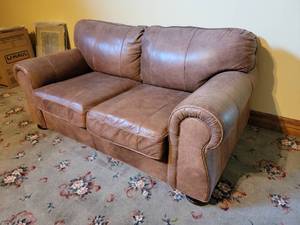 lot 13 image: Rugged Distressed Leather Loveseat