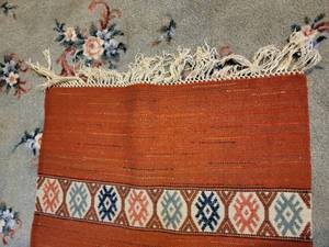 lot 51 image: Bold Red Flat-Weave Table Runner