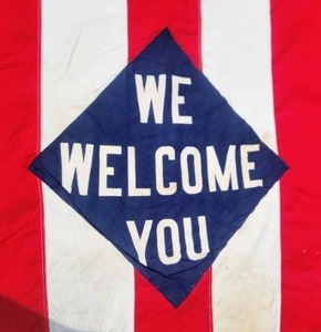 lot 23 image: Antique Patriotic Parade Banner - We Welcome You