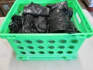 Green Bin Filled with Trash Liners...
