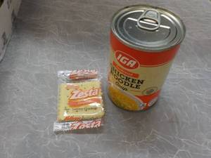lot 310 image: Case of 24 IGA Condensed Chicken No...