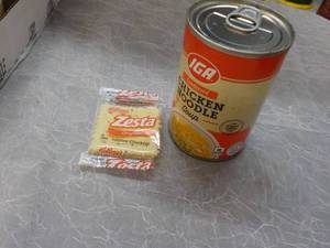 lot 312 image: Case of 24 IGA Condensed Chicken No...
