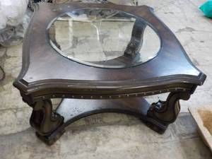lot 1 image: Wood Coffee Table with beveled Glas...