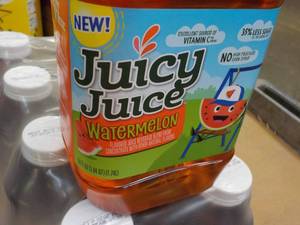 lot 383 image: 8 Pack 59 oz Bottles Juicy Juice Wa...