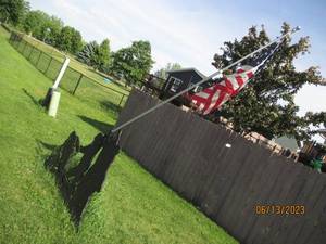 lot 029 image: Veterans metal yard decor