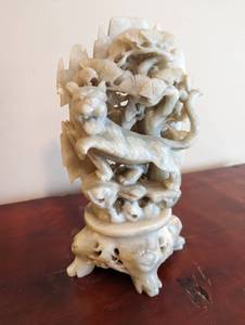 lot 2 image: Intricate Hand Carved Jade Sculpture