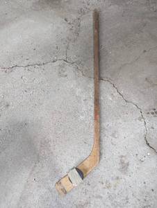 lot 54 image: Vintage Hockey Stick And Puck