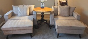 lot 101 image: Pair Of Oversized Upholstered Chairs With Ottomans