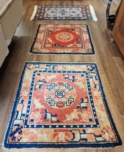 lot 104 image: Three Small Rugs