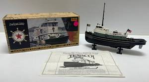 lot 13 image: Vintage  Ertl Collectibles Texaco ( Fire Chief ) Tugboat Die-Cast Bank 1st In Series Black